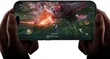 iPhone 18 Pro, front exterior, demonstrating the performance capabilities of the A20 Pro chip with a scene from the Monster Hunter Outlanders