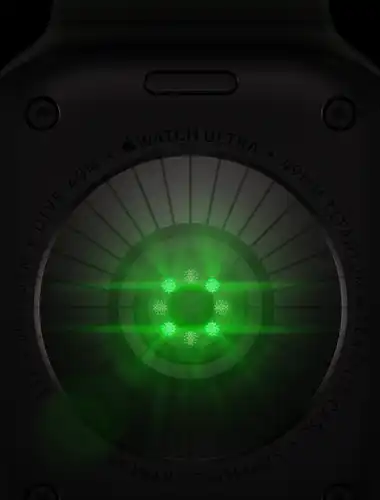 Back of Apple Watch Ultra 4, titanium case, black color, multiple round sensors with glowing green LED lights