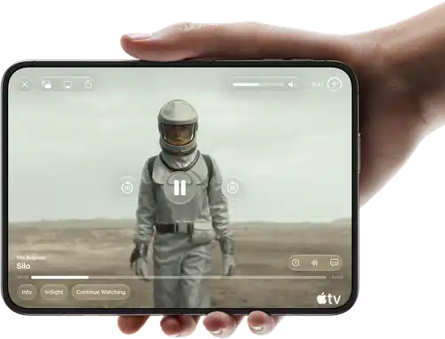 iPhone Duo, held with one hand, opened in horizontal orientation, fully unfolded, interior screen displays Apple TV show 