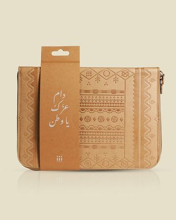 شبابنا×هناك حافظة لابتوب من الجلد